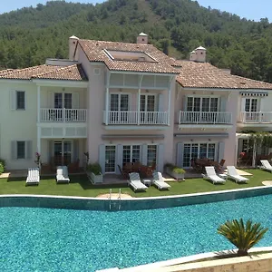 https://portville-holiday-villas.aegeanhotels.net